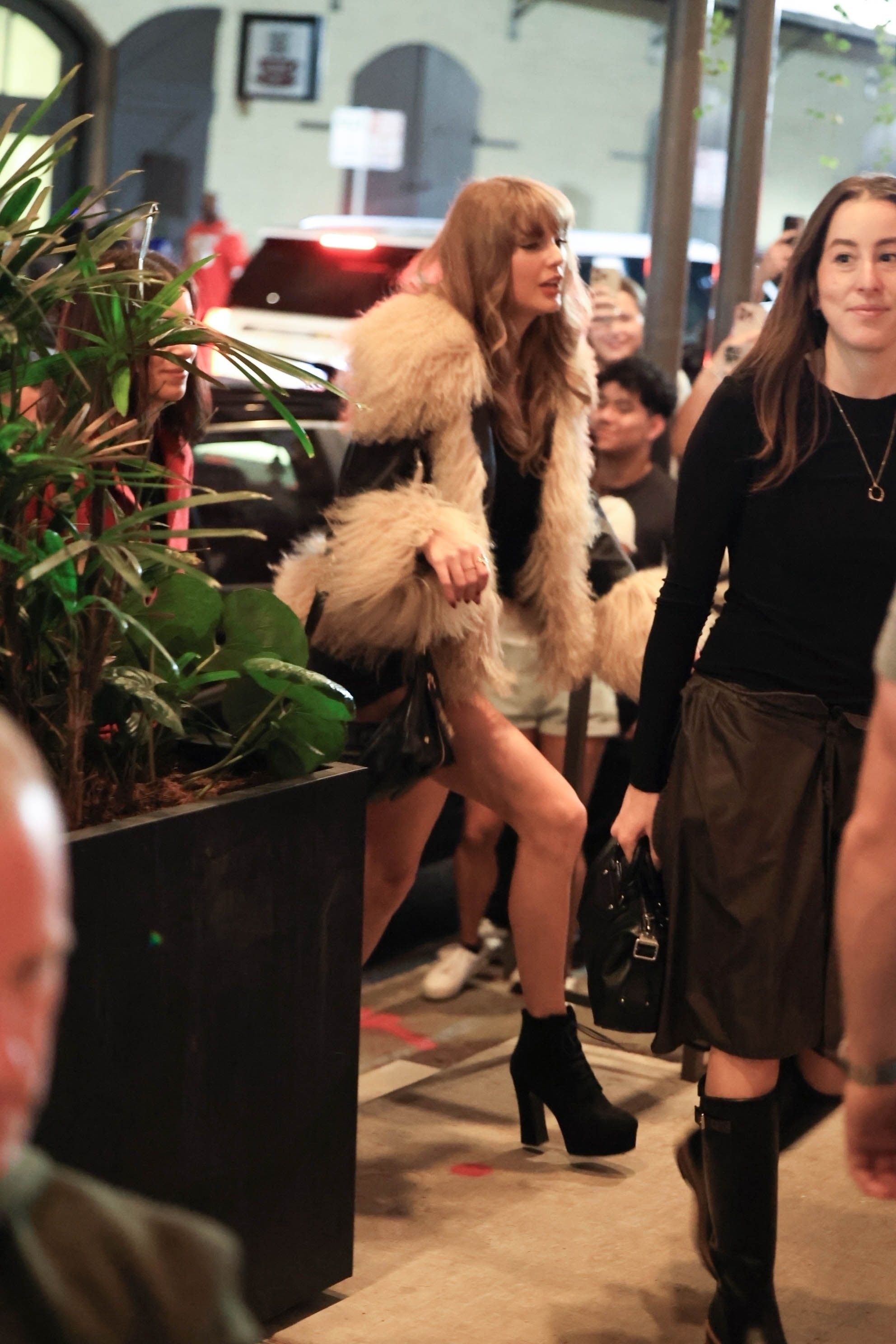 Taylor Swift Resurrects Indie Sleaze with a Shearling Coat and Lita-Style Heels