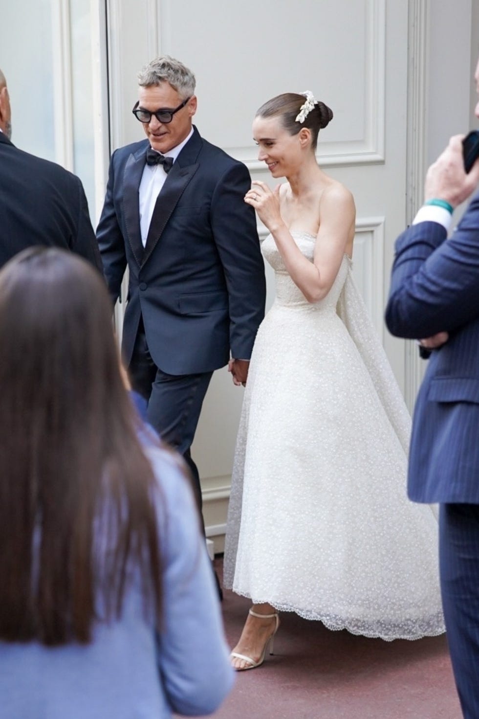 couple in formal attire walking together