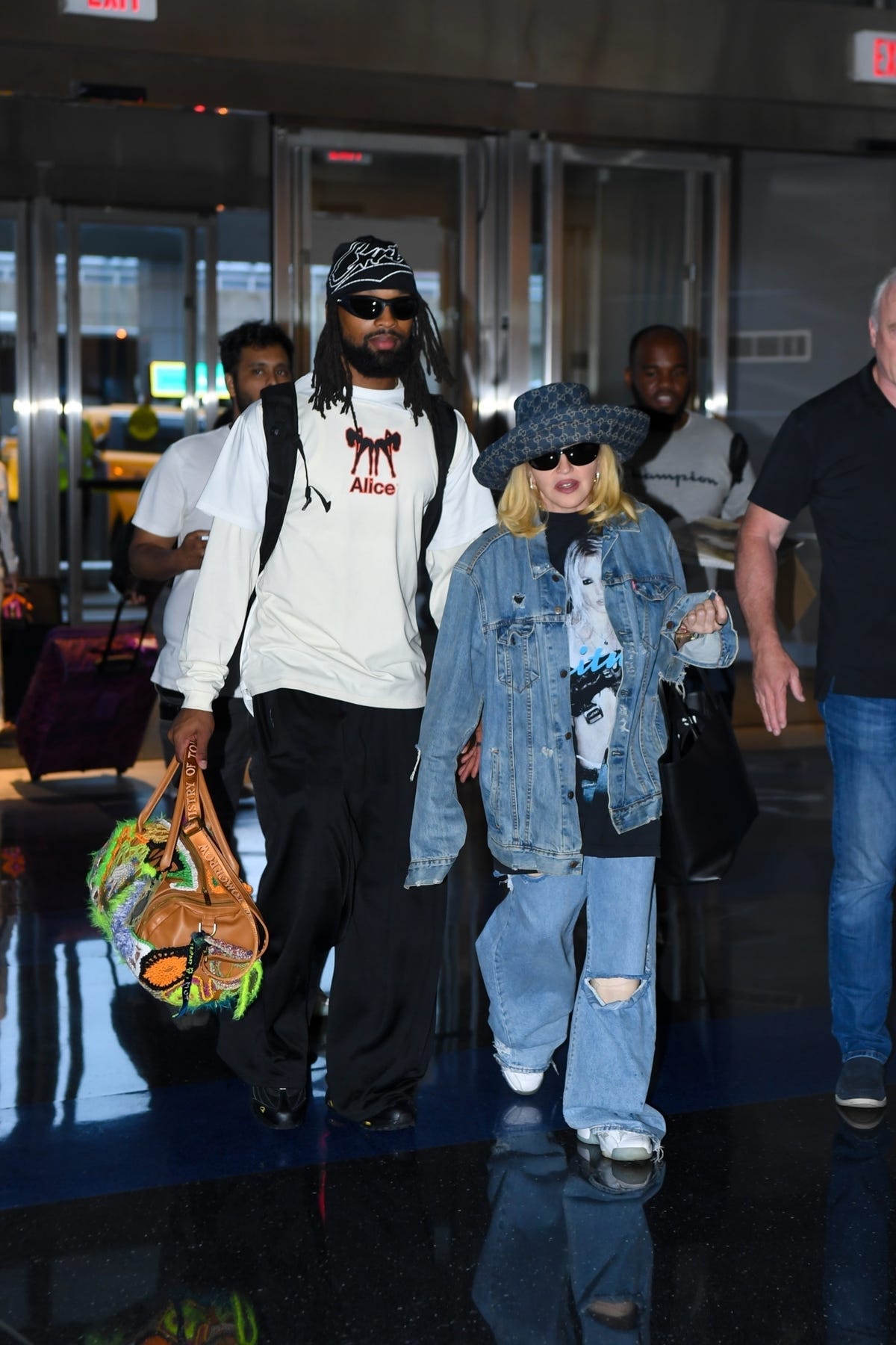 Madonna Does Airport Style in Britney Spears Merch