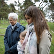 bible verses about death- grandma, mother, and daughter looking at a gravestone in a cemetery bible verses about death grandma mother and daughter looking at a gravestone in a cemetery