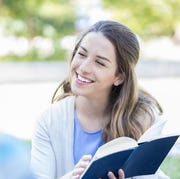 bible verses about happiness man and woman reading from a bible and looking at each other