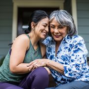 bible verses about kindness two women holding each other and smiling on a porch