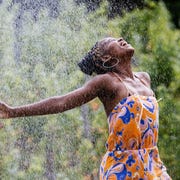 woman dancing in the rain woman dancing in the rain