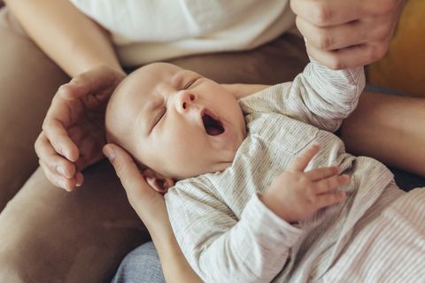 biblical baby names christian names new testament baby in lap yawning