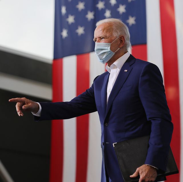 miramar, florida   october 13 wearing a face mask to reduce the risk posed by the coronavirus, democratic presidential nominee joe biden points to supporters during a drive in voter mobilization event at miramar regional park october 13, 2020 in miramar, florida with three weeks until election day, biden is campaigning in florida photo by chip somodevillagetty images