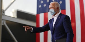 miramar, florida   october 13 wearing a face mask to reduce the risk posed by the coronavirus, democratic presidential nominee joe biden points to supporters during a drive in voter mobilization event at miramar regional park october 13, 2020 in miramar, florida with three weeks until election day, biden is campaigning in florida photo by chip somodevillagetty images