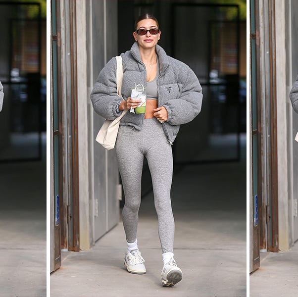 hailey beiber walks down a street wearing alo yoga gear to illustrate a guide to alo yoga black friday cyber monday deals 2022