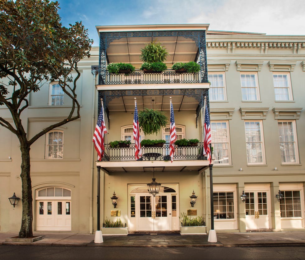 a building with flags on the front