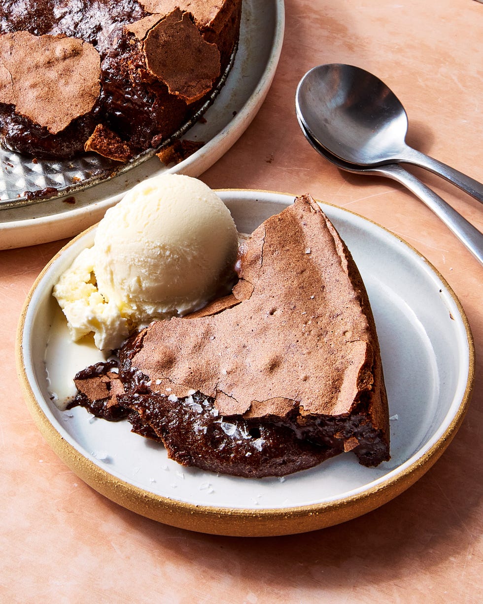 large chocolate lava cake topped with vanilla ice cream