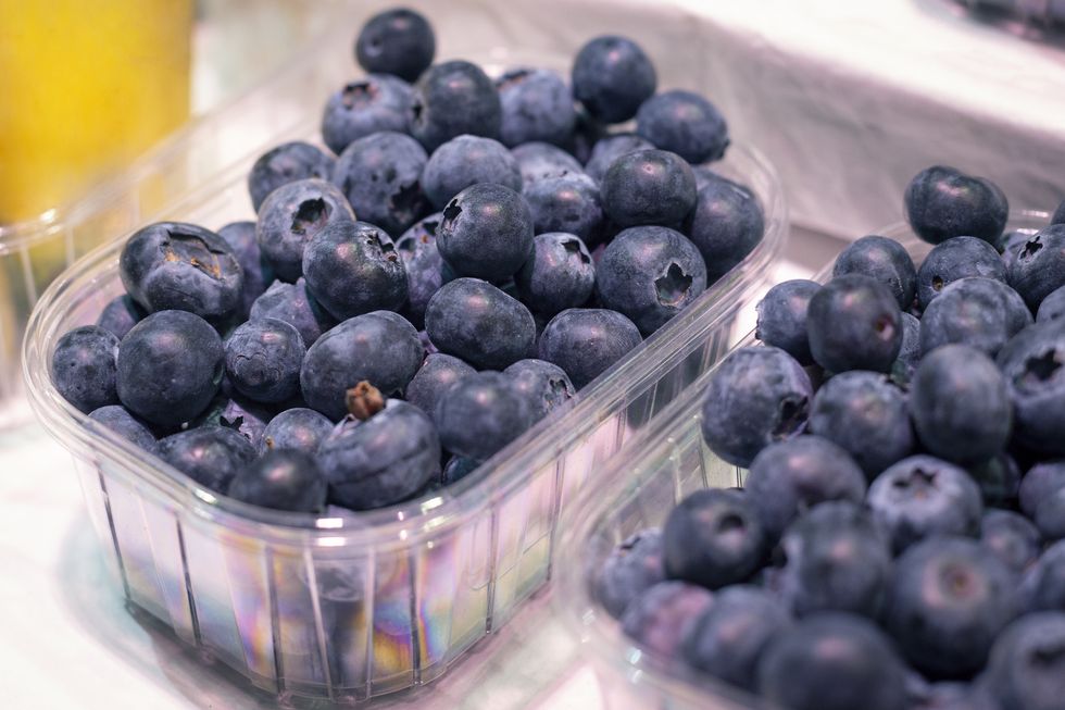 big fresh ripe organic natural blueberry in package on the showplace in the market