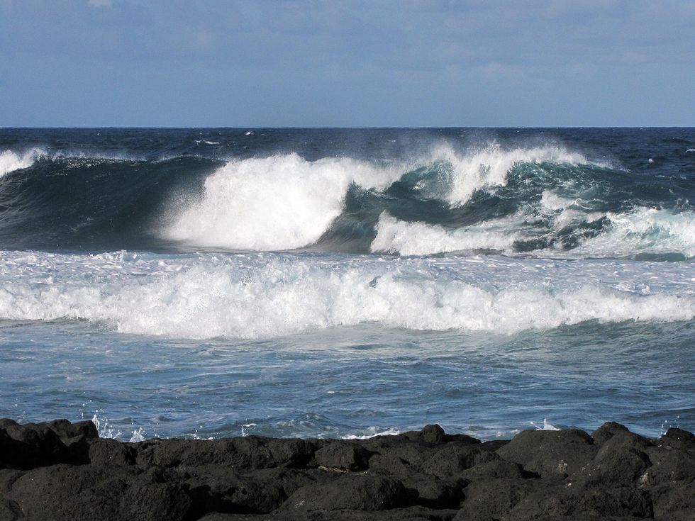 big waves at the beach of roches noires