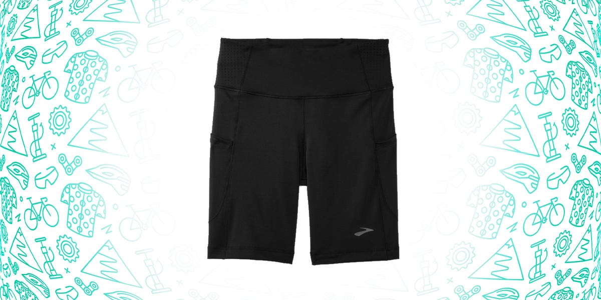 method 8" bike shorts in black against green patterned background