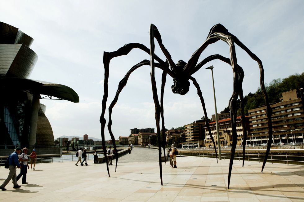 Bilbao. Vizcaya. Basque County. Maman, by Louise Bourgeois, 30-foot-tall spider. Bronze sculpture next to the Guggenheim Museum.