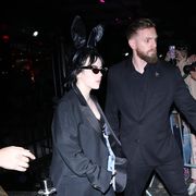 billie eilish wearing a suit and bunny ears at a met gala after party