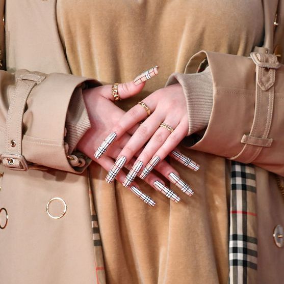 Burberry Check Acrylic nails on woman with Burberry Trench coat