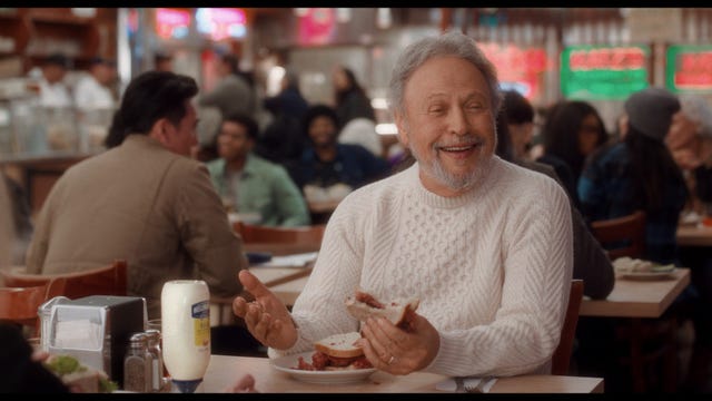 a diner is enjoying food at a bustling restaurant