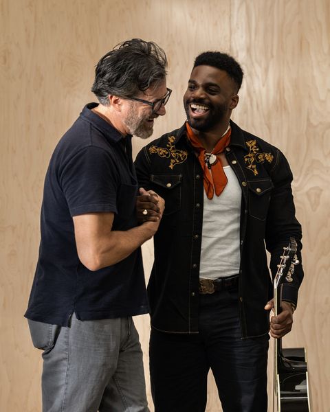 reid backstage with musician abraham alexander shooting the campaign for the collab
