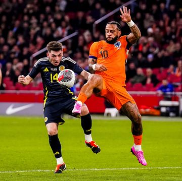 amsterdam, netherlands march 22 billy gilmour of scotland and memphis depay of the netherlands battle for possession during the friendly match between netherlands and scotland at johan cruyff arena on march 22, 2024 in amsterdam, netherlandsphoto by rene nijhuismb mediagetty images