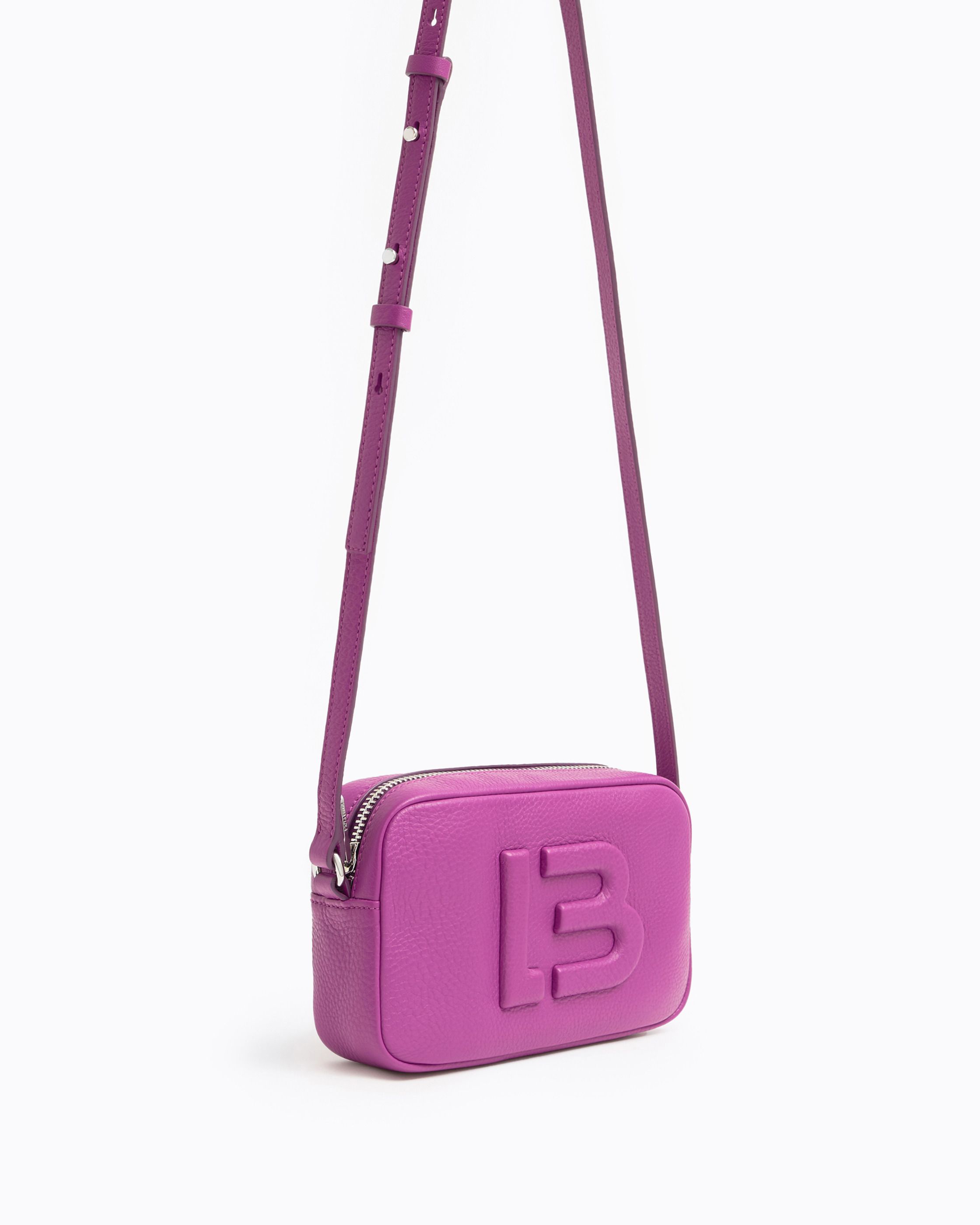 BIMBA Y LOLA. Bolso mini bandolera color rosa pastel.