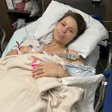 bindi health update patient in bed with medical equipment and iv access