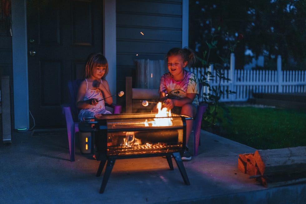 girls roasting marshmallows