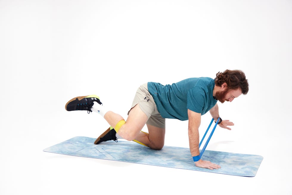 a person doing a trick on a mat