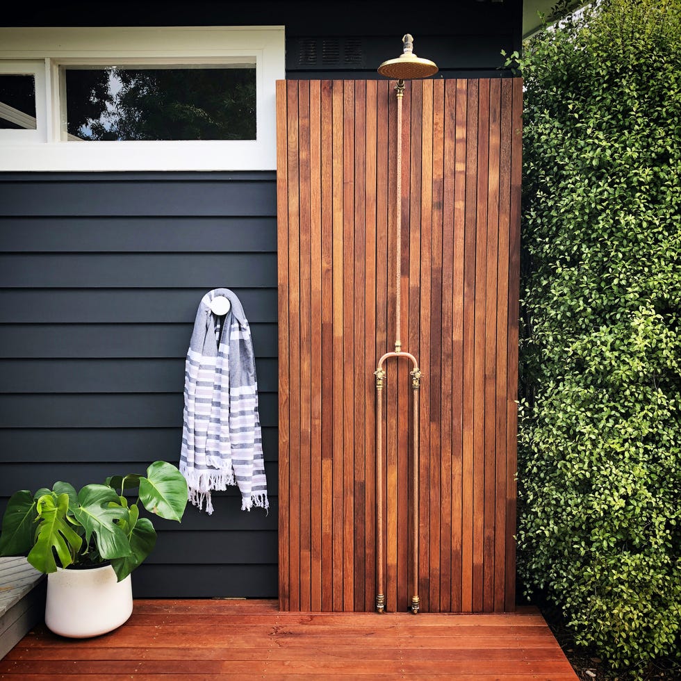 wood paneled outdoor shower