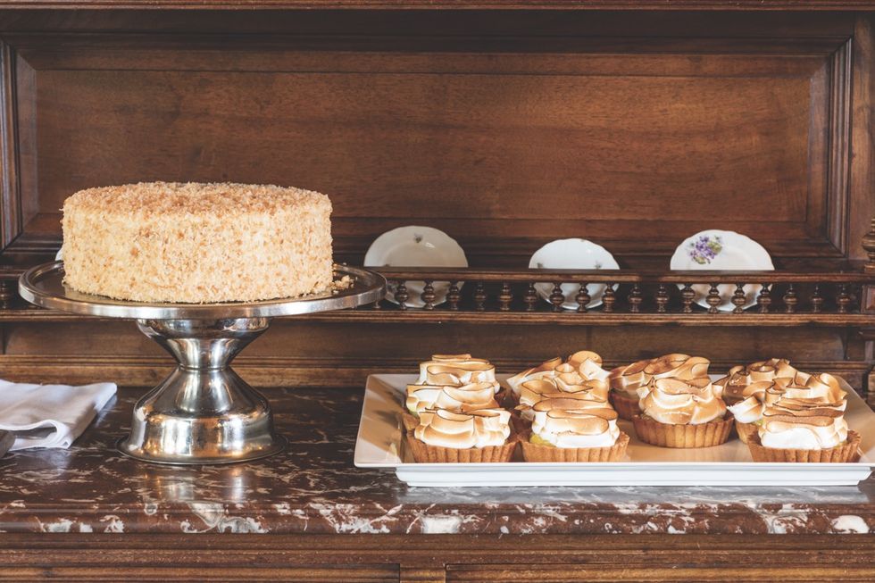 pastry chef dolester'miles coconut cake and lemon tarts on the sideboard