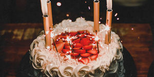 birthday cake with candles and sparklers