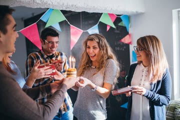 colleagues celebrating a birthday party in the office