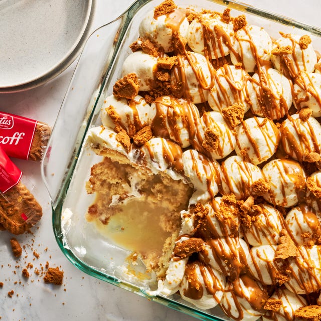 Biscoff Tres Leches tres leches in a casserole dish with biscoff cookies