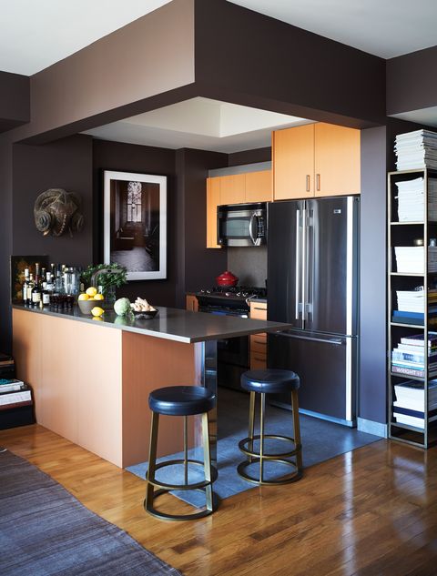 modern, minimal corner kitchen in dark colors