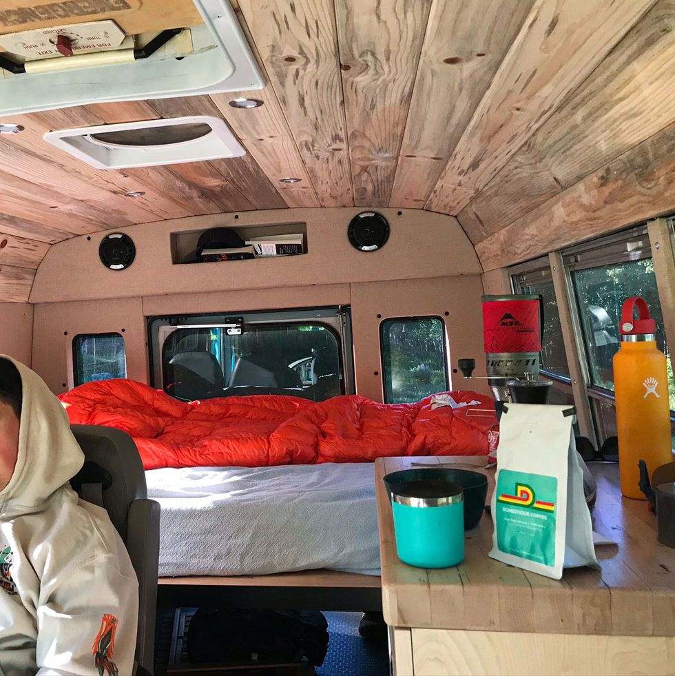 sarah sturm and dylan stucki createdspace in their skoolie for a bed for two