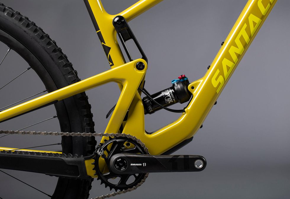 Bicycle part, Bicycle, Bicycle frame, Bicycle wheel, Vehicle, Bicycle drivetrain part, Yellow, Bicycle tire, Mountain bike, Groupset, 