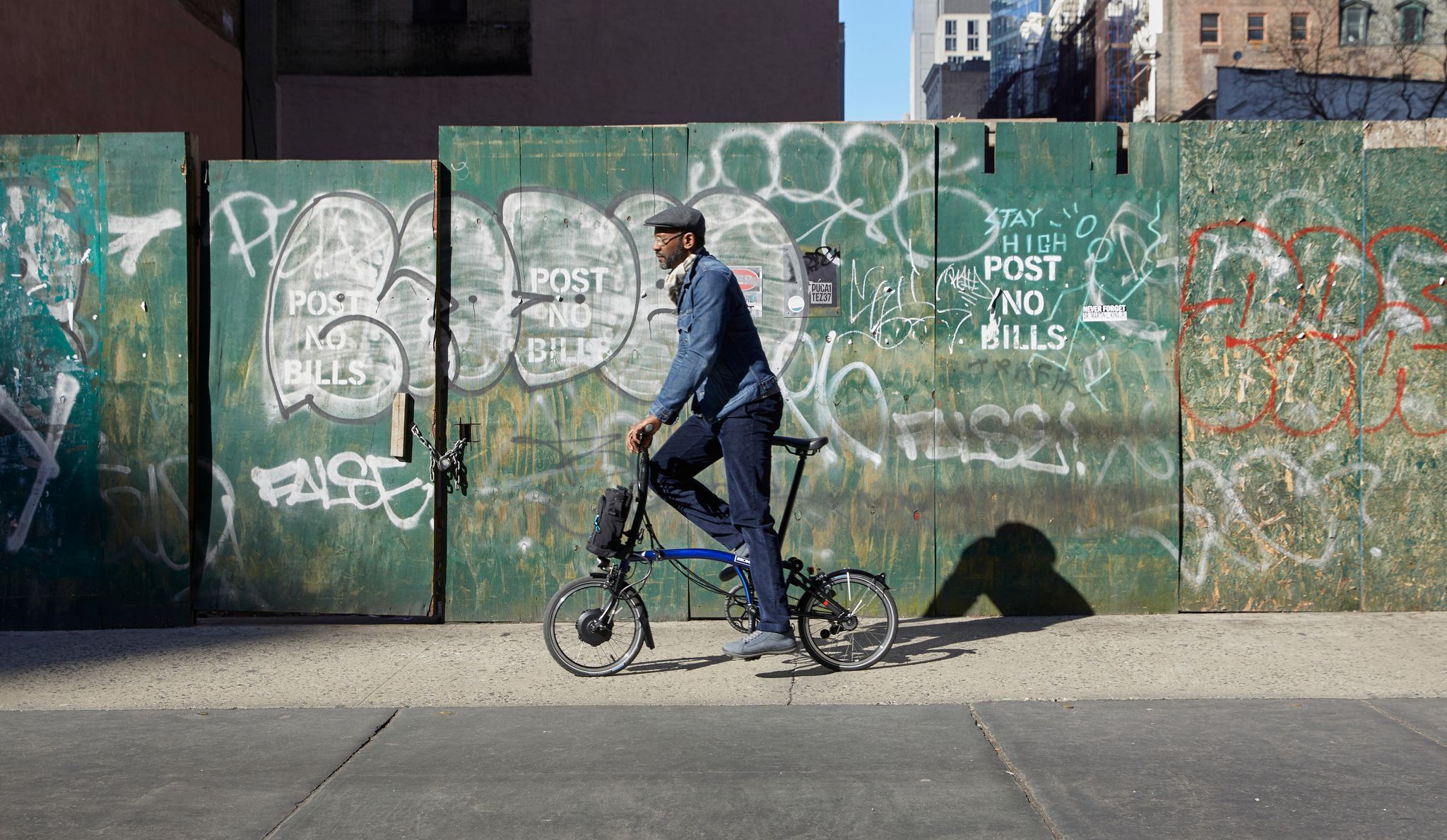 Bicycle, Bmx bike, Freestyle bmx, Urban area, Street art, Cycle sport, Wall, Vehicle, Street, Art, 
