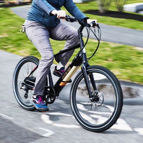 a person riding an aventon electric bike