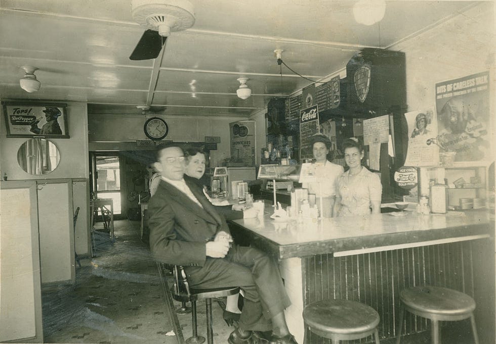 diners and staff at counter
