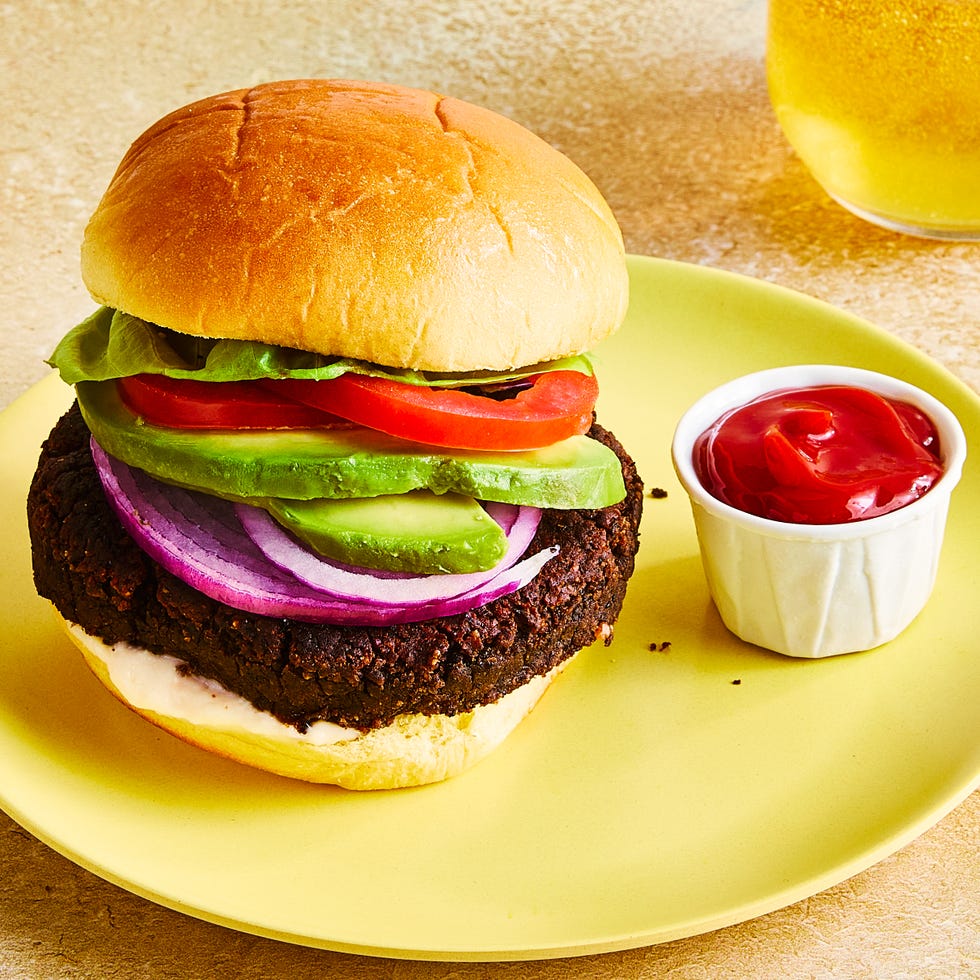 black bean burgers with tomato, lettuce, red onion, and avocado