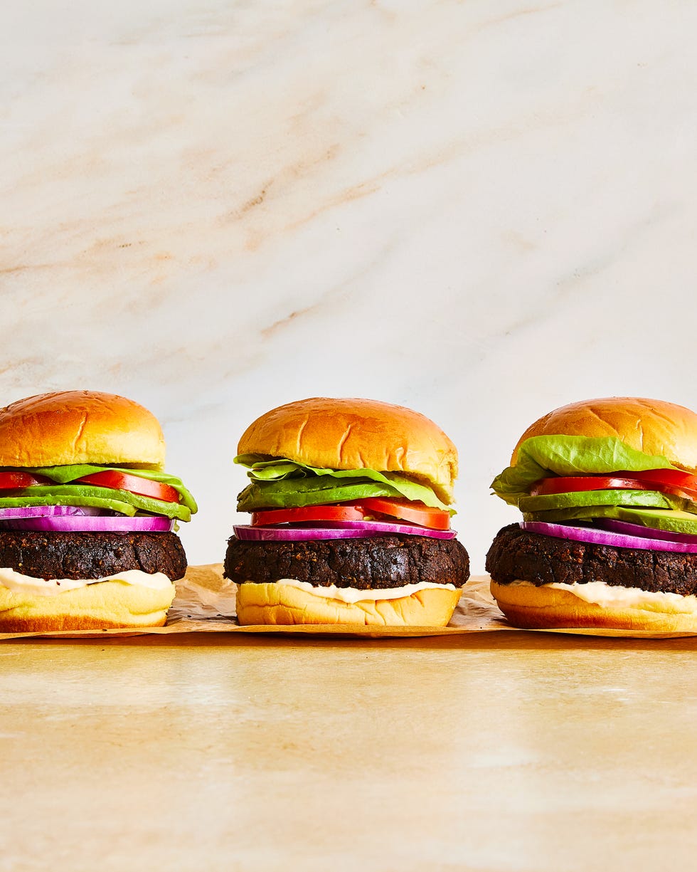 black bean burgers with tomato, lettuce, red onion, and avocado