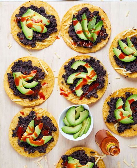 open tostados with avo and hot sauce