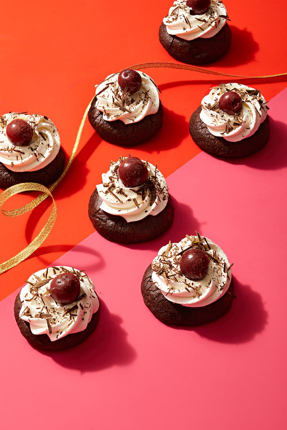 black forest cookies with cherry and chocolate shavings on top
