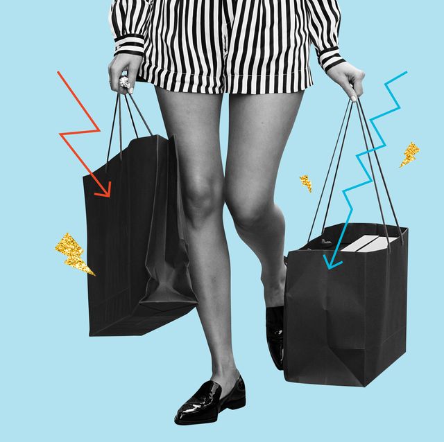 a woman carrying black shopping bags
