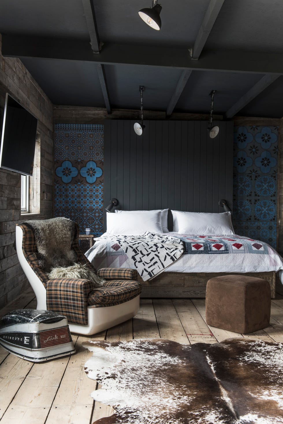 a black bedroom with stylish accessories