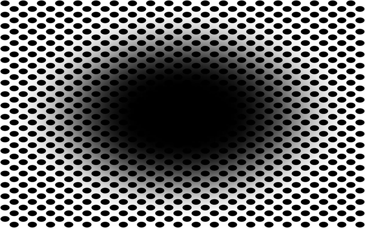 black hole illusion with darkness in center and black dots surrounding it