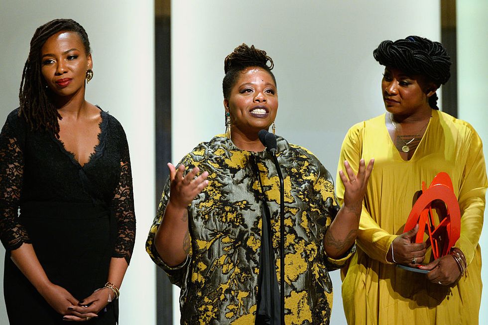 los angeles, ca   november 14  l r honorees opal tometi, patrisse cullors, and alicia garza accept an award onstage during glamour women of the year 2016 at neuehouse hollywood on november 14, 2016 in los angeles, california  photo by kevork djanseziangetty images for glamour