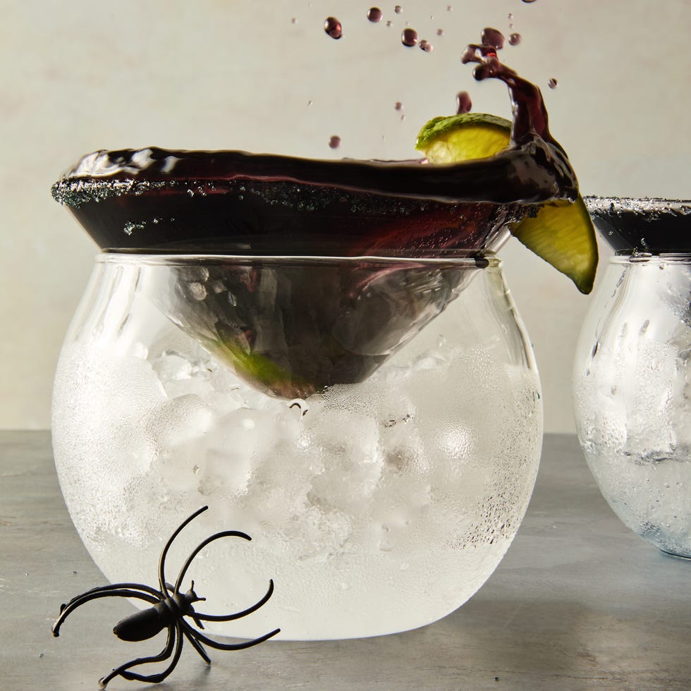 black magic margaritas in a cup of ice