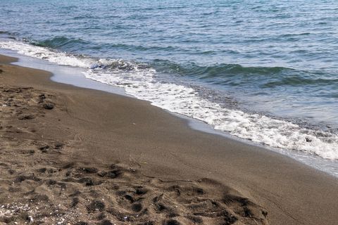 Black magnetic sand beach of Black sea in Ureki, Georgia