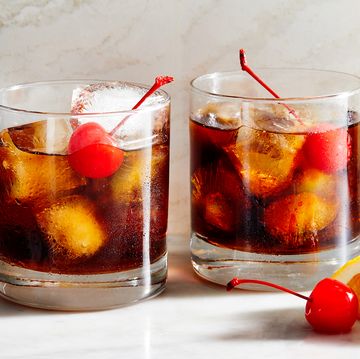 black russian with cherries and an orange slice