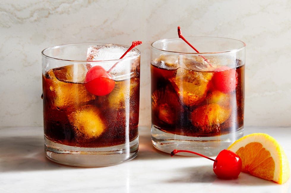 black russian with cherries and an orange slice