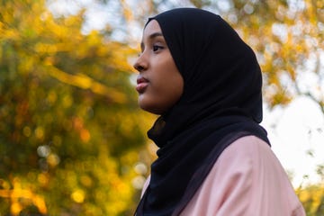 Black woman in hijab in nature